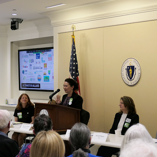 HEET cofounder Zeyneb Magavi addressing a crowd of legislators, aides and activists at the Massachusetts State House