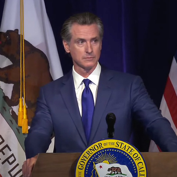 Gov. Gavin Newsom discusses his revised budget proposal in a press conference Friday.
