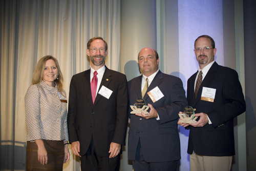 Stan Meiburg, second from left, with officials of Volkert Inc., winners of a Gulf Guardian Award in 2011. (Source: EPA)